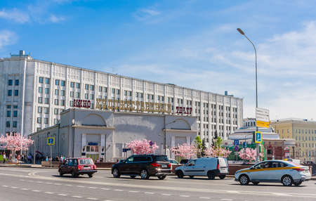 View of the buildings of the Khudozhestvenny cinema on Arbat Square. In the background, the General Staff of the Armed Forces of the Russian Federation. Moscow, Russia.のeditorial素材