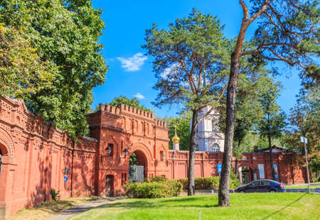 Huge old brick gates of the Pokrovskoe-Streshnevo Estate on a Sunny summer day. Moscow. Russiaのeditorial素材