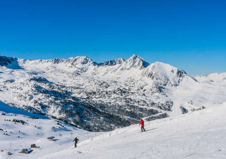 Ski resort GrandVallira. Views of the Pyrenees mountains. Ski cabins with skiers. Rest with the whole family and friends. Andorraのeditorial素材