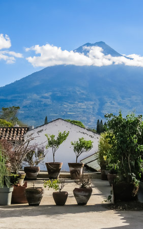 View of Antigua Guatemala and the volcano near the cityの写真素材