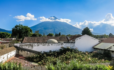 View of Antigua Guatemala and the volcano near the cityの写真素材
