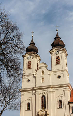 Tihany village on shores of Lake Balaton, Tihany Peninsula, Hungary. 17th century Baroque church built on site of the 10th century Benedictine Abbey.の写真素材