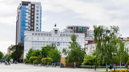 The building of the Council of Deputies of the city of Grozny with portraits of Vladimir Putin and Akhmad Kadyrov on the facade. Grozny, Chechen Republicのeditorial素材