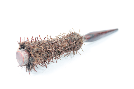 Old big wooden hairbrush, on a white backgroundの写真素材