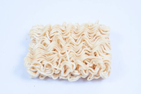 Noodles row in bowl isolated on white backgroundの写真素材