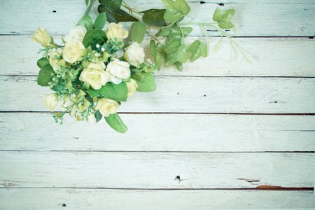 flowers on wooden background