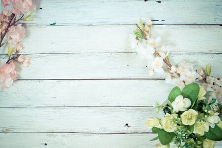 flowers on wooden background