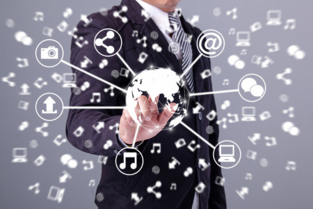 Hands holding circle global network connection,Business man holding social mediaの写真素材