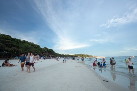 Koh Samet, Thailand - August 13, 2016 - Lonely girl walking in an idyllic beach in Koh Samet in Thailand.のeditorial素材