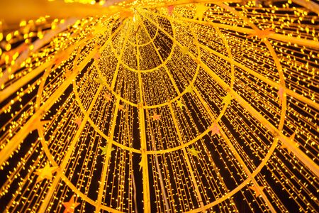 gold bokeh abstract background defocused lights,  christmas light night bokehの写真素材