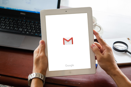 Sakon Nakhon, THAILAND -August 1,2017: Google Gmail email inbox interface on the Apple MacBook Pro screen that is on office desk. Gmail is a free email service provided by Google. Varnaのeditorial素材