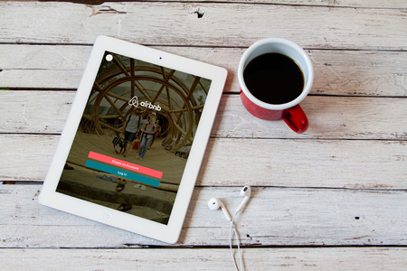 BANGKOK,THAILAND - April 22,2016:IPad open Airbnb application. Airbnb is a website for people to list, find, and rent lodging.のeditorial素材