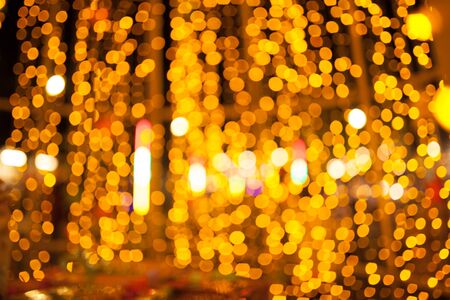 gold bokeh abstract background defocused lights,  christmas light night bokehの写真素材