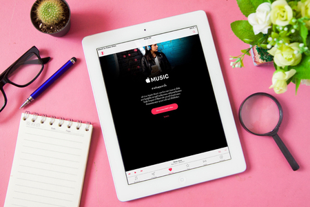 BANGKOK,THAILAND - May 7,2016:: Apple music application on the display of iphone and ipad gadgets. Apple Music is a music streaming service developed by Apple Inc.のeditorial素材