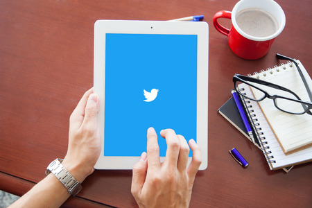 bangkok, thailand - June 17.2016: Twitter logo on the screen. Twitter is a social media online service for microblogging and networking communication.のeditorial素材