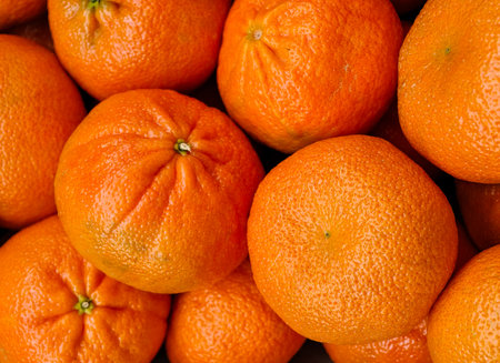 Fresh and Juicy mandarins Piled Together â€“ Vibrant High-Resolution Abstract Background...