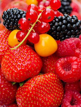 Colorful Berry Medley: Fresh Strawberries, Blueberries, and Blackberries for a Vibrant...