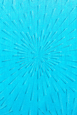 abstract background of a blue fabric with a pattern of concentric lines