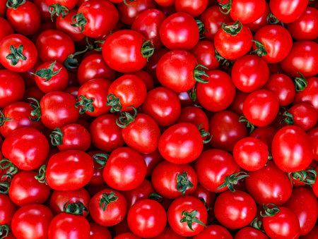Tomato background. Lots of fresh red tomatoes. Top view.