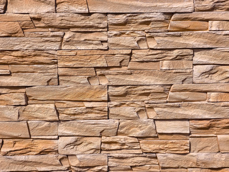 High-Resolution Light Brown Stone Wall Texture. Versatile Digital Backdrop for Background, Web...