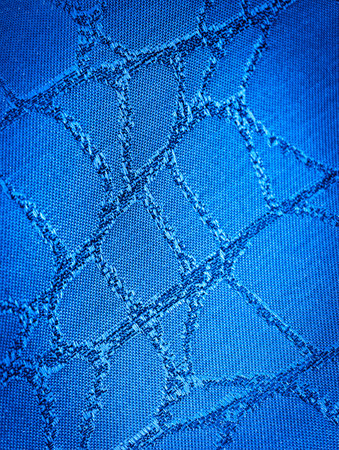 Blue Denim Fabric Texture with Diagonal Stitching Detail for Fashion and Textile Design Copy Space...