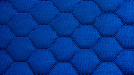 Royal blue abstract hexagon texture background with vibrant cobalt blue tones, geometric honeycomb stitched pattern and quilted detail. Ultra high-resolution 8K wallpaperの写真素材