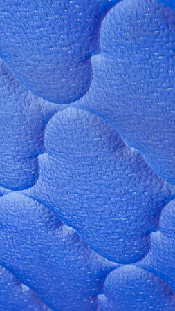 Sapphire sculpted waves create a serene 8K wallpaper vertical background with generous copy space...