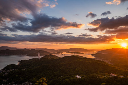 Sunset over the Seto Inland Sea Viewed from Takamiyama Observatory, Onomichi City, Hiroshima Prefecture, Japanの写真素材