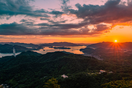 Sunset over the Seto Inland Sea Viewed from Takamiyama Observatory, Onomichi City, Hiroshima Prefecture, Japanの写真素材