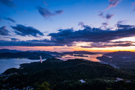 Sunset over the Seto Inland Sea Viewed from Takamiyama Observatory, Onomichi City, Hiroshima Prefecture, Japanの写真素材