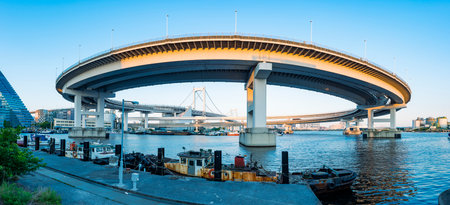 Shibaura Loop Bridge and Rainbow Bridge at Sunrise, Minato City, Tokyo, Japanの写真素材