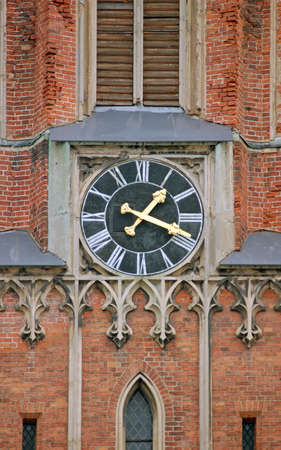 Clock on a facade of church.の写真素材