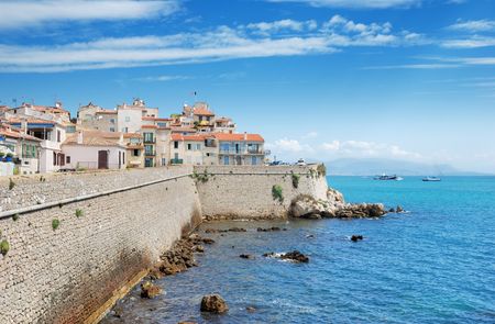 Ligurian sea and coastal wall in Antibes, France.の写真素材
