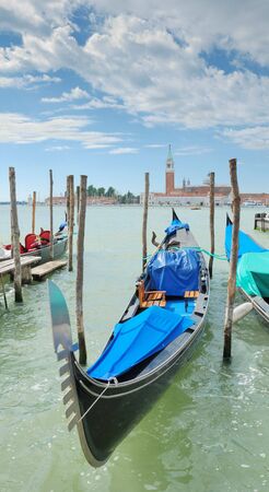 Gondola on the San Marco canal and Church of San Giorgio Maggiore in Venice, Italia.の写真素材