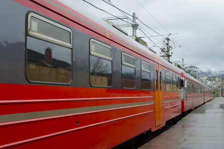 red train at a stationの写真素材