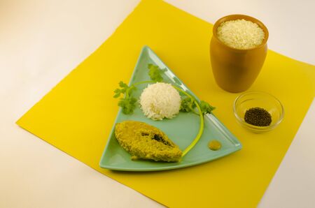Hilsa fish is cooked in mustard sauce. It is typically eaten in West Bengal.の写真素材