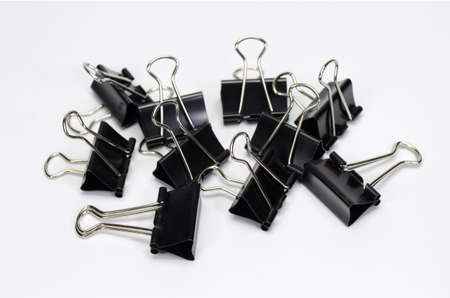 Black paper clip  isolated on white background.