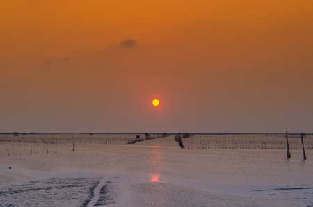 Ocean and beach at sunset. Bang Sai, Chonburi Thailand Coast.