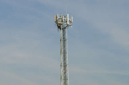Phone antenna.The transmission poles in the area. Behind the clear skies.