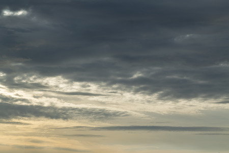 Sunset with clouds, light rays and other atmospheric effect.