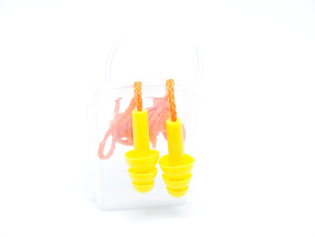 Close-up ear plugs stoppers for protection against noise , isolated on a white background.