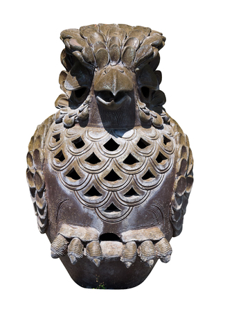 Statuette of a cute owl on a white background.の写真素材