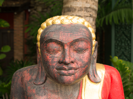 close up view of old concrete Buddha statue.の写真素材