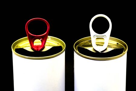 Empty opened tin can on black background.