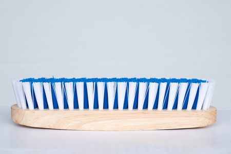 Wood brush for cleaning house on white background.の写真素材