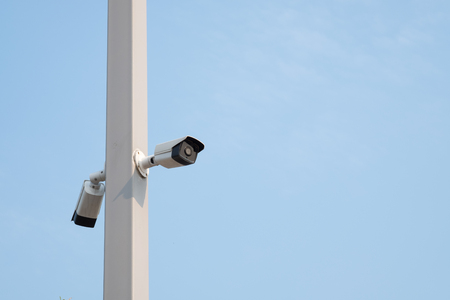 CCTV Camera. Security surveillance system with blue sky.の写真素材