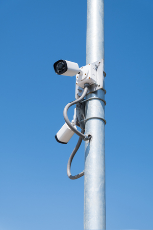 CCTV Camera. Security surveillance system with blue sky.の写真素材