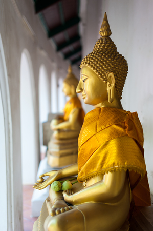 Gold buddha statue. old vintage buddha state, Thailand temple.のeditorial素材