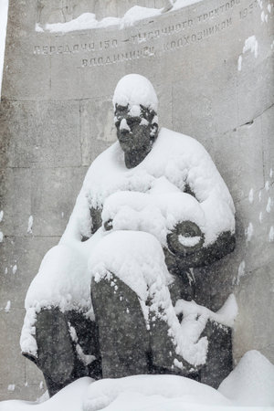 The monument to worker under the snowの写真素材