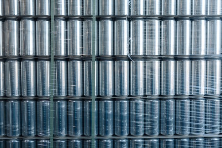 Many aluminum cans without labels in stock.